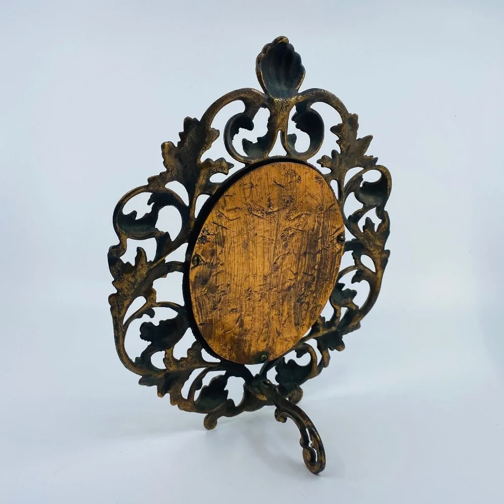 Antique Bronze Ornate Free Standing Beveled Mirror.